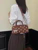 Bolsa de mão única e estilosa 2026, bolsa de ombro simples com bolinhas para o dia a dia, bolsa de ombro versátil e da moda estilo ins