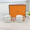 Venda Direta Transfronteiriça Fundo Preto Linha Vermelha Porcelana Óssea Xícara de Café e Pires com Colher Conjunto para Chá da Tarde Conjunto de Xícara de Cerâmica Caixa de Presente