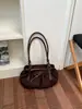 Bolsa de ombro estilosa com laço transfronteiriça para mulheres, nova versão coreana, bolsa de mão moderna para o dia a dia, bolsa de ombro de alto valor, na moda