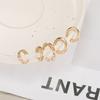 Clips para la oreja de moda popular transfronteriza para hombres y mujeres, aretes personalizados de lujo ligero, cartílago falso sin perforar, aretes retro simples al por mayor