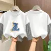 Camiseta de manga larga para niño 2026 nueva ropa de otoño para niños, camiseta básica de algodón puro de imitación de dos piezas para niño, top para niños mayores