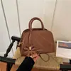 Bolso pequeño de diseño moderno para mujer, nueva colección 2026, bolso cruzado simple, bolso de mano moderno y casual, perfecto para el uso diario
