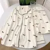 Pijama de forro polar estilo dulce con nudo de mariposa, nuevo conjunto de cárdigan de manga larga de moda otoño/invierno para mujer