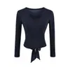 Top T-shirt feminino puramente desejável, estilo hot girl, decote V, falso duas peças, novo estilo de verão com amarração e laço, calça flare de cintura alta afunilada