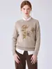 Cardigã de Malha Floral Estilo Francês Temperamento para o Trabalho Feminino 2026 Outono Novo Design Sense Bordado Floral Top de Lã