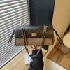 Bolso tote acolchado nuevo estilo Chanel con cierre de hebilla de piel de becerro de capa superior, bolso de hombro con asa larga, bolso de mujer moderno de gran capacidad