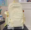 Mochila leve de cor sólida estilo japonês, adequada para viagens ao ar livre, com grande capacidade, versátil para uso casual e ideal como mochila para o dia a dia para estudantes universitários.