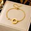 Pulsera de joyería de moda dorada ins para combinar con todo, pulsera de acero de titanio simple de lujo ligero, trébol de cuatro hojas para mujer, transfronteriza