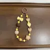 Nuevo Estilo Lazo Corazón Dopamina Cadena para Teléfono Colgante para Funda de Teléfono Colgante para Bolso Cadena para Accesorios de Auriculares Venta al por Mayor
