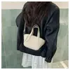 Nuevos bolsos pequeños de moda para mujer, populares este año, bolsos de nicho a la moda, bolsos de hombro y cruzados simples y versátiles