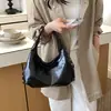Bolso tote texturizado transfronterizo 2026 nuevo bolso de mano de verano bolso de hombro de moda con tachuelas bolso de axila de gran capacidad para mujer