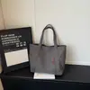 Bolso tote grande, simple y elegante, perfecto para ir al trabajo y para uso casual, ideal para estudiantes universitarios en 2026, un bolso de hombro moderno para la escuela y el uso diario