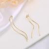 Pendientes minimalistas de borla con forma de arco para mujer, diseñados para realzar la apariencia de un rostro más delgado, populares en redes sociales, largos y sencillos