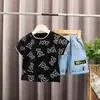 Estilo Coreano Verão Novo Estilo Coreano Conjunto de Shorts de Manga Curta com Gola Redonda para Crianças Conjunto de T-shirt e Shorts de Desenho Animado para Bebês Tendência