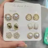 Pendientes de bola redonda metálicos brillantes de lujo ligero y de alta gama para mujer, adecuados para caras cuadradas y redondas, efecto adelgazante, pendientes vintage
