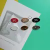Ins Hebilla de Lazo Ovalada con Agujero de Resina Coreana Moda Versátil Accesorios de Ropa Accesorios de Botón Decorativos Venta al por Mayor