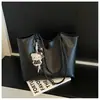 Bolso Retro de Gran Capacidad para Mujer Otoño 2026 Nuevo Bolso de Hombro Casual para el Trabajo Bolso Tote de Temperamento Simple y Elegante