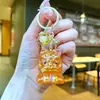 Tendencia Nacional Figura de León Dibujo Animado Llavero Colgante de León Mochila de Estudiante Adorno de Cristal Transparente Llavero al por Mayor