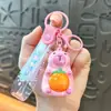 Llavero de dibujos animados creativos kappi bala de cara giratoria lindo colgante para mochila escolar llavero para llaves de coche pequeño regalo al por mayor