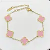 Pulsera de acero de titanio chapada en oro de 18k, de cuatro hojas, lisa, de moda, de venta caliente, con nácar de doble cara, fábrica de joyería de alta gama para mujer