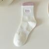 Calcetines blancos para mujer, primavera y otoño, calcetines de media pantorrilla, color sólido, combinan con todo, calcetines de algodón con letras, calcetines deportivos largos modernos ins al por mayor