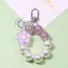 Llavero de Flor con Cara Sonriente Colgante DIY para Funda de Teléfono Móvil Cubierta Protectora para Aripods Colgante para Estuche de Auriculares Joyería