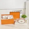 Venta Directa Transfronteriza Fondo Negro Línea Roja Porcelana de Hueso Taza de Café y Platillo con Cuchara Juego para el Té de la Tarde Cerámica Taza Set de Caja de Regalo