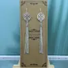 Brincos Mongóis femininos estilo étnico brincos de franja longa elementos mongóis joias de imitação de prata atacado