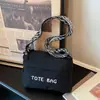 Bolsa de Tela Lavable Versátil de Gran Capacidad para el Verano 2026 Nuevo Elegante Letra Alto Grado Mamá Bolso Tote Hombro
