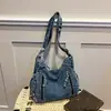 Transfronterizo 2026 Nuevo Bolso de Motocicleta Francés Retro Lavado Desgastado Chica Caliente Gran Capacidad Estilo Wasteland Bolso de Hombro Cruzado