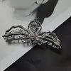Colección de pinzas para el pelo de Halloween de Yiwu transfronterizo al por mayor con calaveras, calabazas y telarañas, perfectas para crear una atmósfera espeluznante para fiestas y reuniones.