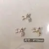 Arte de Uñas Transfronterizo Ultra Brillante Circonita Lazo Plateado Decoración de Uñas Celebridad de Internet Popular Venta Caliente Mariposa Pequeña Accesorios para Uñas Al por Mayor