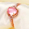 Anillo de cristal en polvo con diseño de signo de interrogación de temperamento Kaiwei anillo con incrustación de piedra de hibisco natural fabricantes lote mixto de primera generación