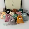 Bolsa de almacenamiento de pana de color sólido de gran capacidad, bolsa de cosméticos con cordón, bolso rojo portátil para mujer, monedero