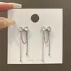 Pendientes de botón largos con borla y lazo de plata de ley S925, diseño de nicho femenino, temperamento de lujo ligero, pendientes de alta calidad