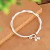Pulsera de Tobillo de Plata Trenzada Retorcida Rodeando Flor de Lirio del Valle 9999 Viento Creativo para Mujer Colgante de Flor Carrillón de Viento Pulsera Abierta Mate Modelo para Mujer