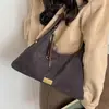 Bolso de axila para mujer 2026 nuevo de moda otoño gama alta vintage versátil bolso de hombro para el trabajo y los desplazamientos bolso cruzado