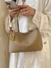 Nuevo bolso de axila de nicho 2026, bolso tipo almohada minimalista y elegante, bolso de hombro versátil, bolso cruzado simple, moderno