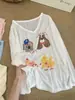 [Brisa de Tarde] Camiseta estampada con temática de dibujos animados para mujer, una cubierta ligera de manga larga de corte holgado para protección solar en verano
