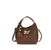 Bolso de mano de nicho estilo coreano para mujer, nueva colección de invierno 2026, bolso de hombro retro, adecuado para el trabajo y los desplazamientos, bolso tipo cubo