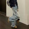 Pantalones de mezclilla azul claro desgastados estilo americano 2024 nuevo viento perezoso para parejas nicho todo partido