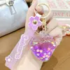 Pingente de chaveiro de morango brilhante com infusão de óleo fofo, decoração de chaveiro de mochila de brinquedo cartoon feminina moderna, pequeno presente