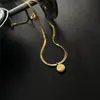 Collar de acero y titanio con perlas de agua dulce naturales para mujer, cadena de clavícula exquisita de alta calidad, joyería anticaída al por mayor