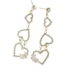 Pendientes Elegantes de Corazón con Colgante de Circonita Estilo Coreano de Lujo Ligero para Mujer Pendientes Largos Exquisitos de Pedrería Transfronterizos Europeos y Americanos Venta al por Mayor