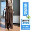 Foto real de elegantes pantalones anchos de capas con accesorios en la cintura para mujer, nuevo lanzamiento de verano 2026, de cintura alta, fluidos, de seda helada, algodón y lino, casuales