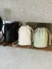 Bolso de Cubo de Verano Transfronterizo Nuevo Estilo Patrón Suave de Lichi con Cordón para Mujer, Bolso Sencillo y Versátil de Cuero Suave para Hombro Cruzado Teléfono