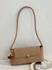 Bolso de axila texturizado casual retro para mujer 2025 nuevo de verano bolso de hombro de nicho francés bolso baguette de moda