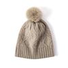 Venta al por mayor de gorro de cachemira para mujer, bola de pelo retorcida, otoño e invierno, nuevas orejeras de punto de lana gruesa, gorro cálido para la generación del cabello.