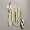 Calça pantalona na cor cáqui com barra curva, apresentando zíper e corte reto, para mulheres, nova coleção outono 2026, projetada para baixinhas, cintura alta, modelagem solta e casual.