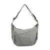 Bolsas de ombro lisas estilo francês para atacado, modernas e versáteis, com um toque de luxo, adequadas para estudantes e com grande capacidade e design crossbody.